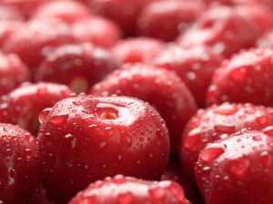 Wet ripe red cherry.